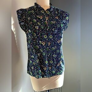 Tory Burch 100% Silk floral top, short sleeve, size 8.